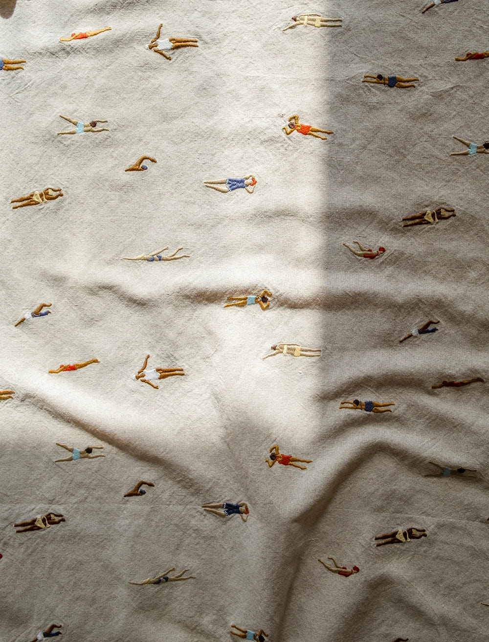 SWIMMERS EMBROIDERED FABRIC