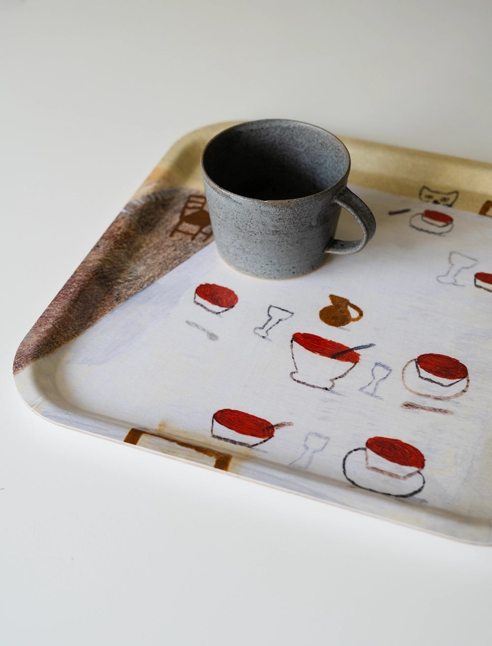 KITTEN WITH SOUP TABLETT